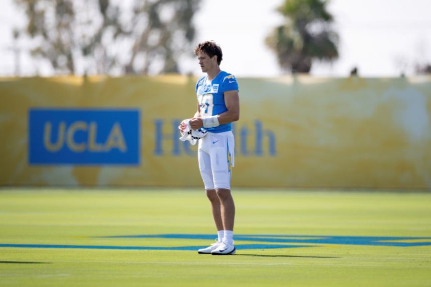 Los Angeles Chargers quarterback Justin Herbert stands on the field during training camp for the NFL football team Thursday, July 17, 2025, in El Segundo, Calif. (AP Photo/Eric Thayer)