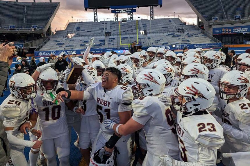 Rigby High School players celebrate a 6A State Football Championship after beating Eagle, 41-21, Saturday at Boise State University’s Albertsons Stadium. | Kalama Hines, EastIdahoNews.com