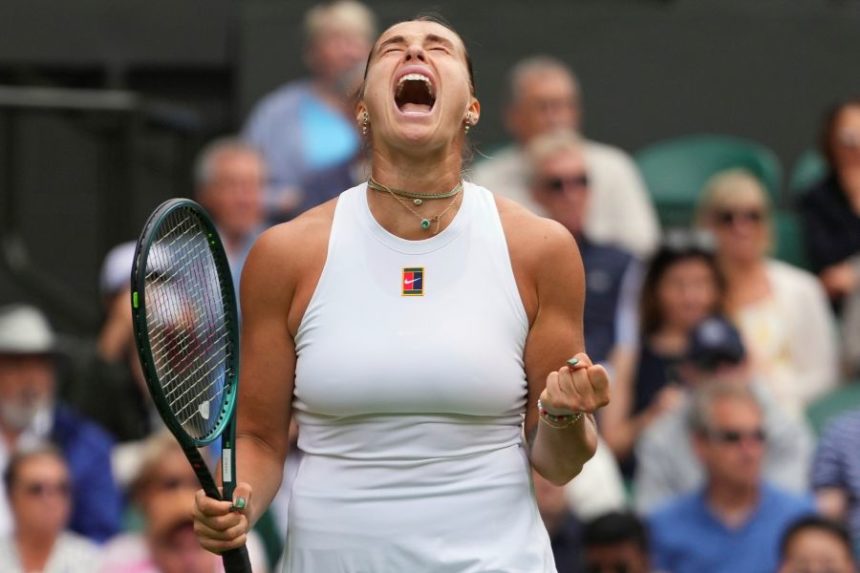 Aryna Sabalenka of Belarus reacts during her second round women's singles match against Marie Bouzkova of the Czech Republic at the Wimbledon Tennis Championships in London, Wednesday, July 2, 2025.(AP Photo/Kirsty Wigglesworth)
