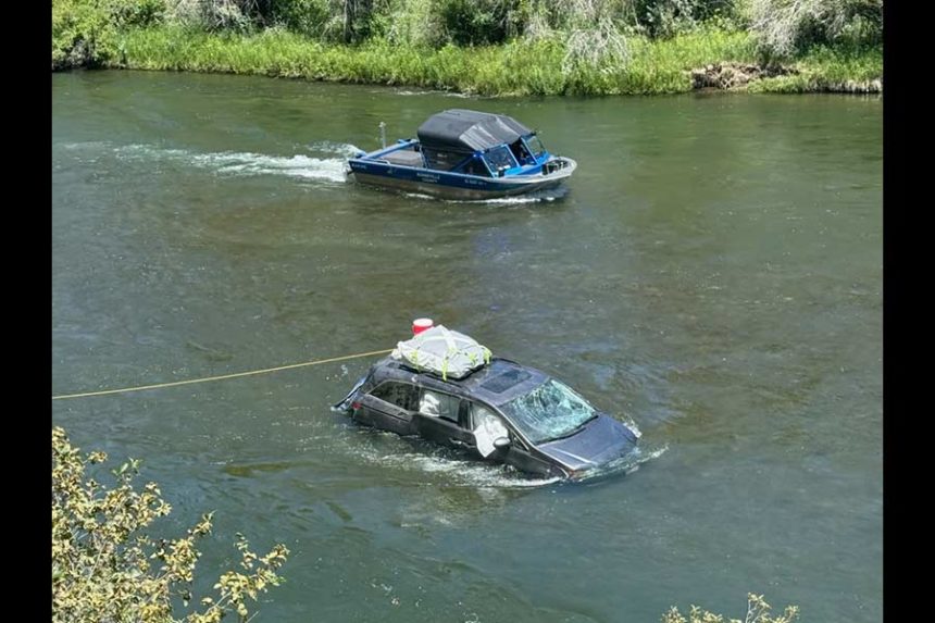 A Utah family narrowly escaped after driving into Snake River Monday afternoon. | Courtesy Bonneville County Sheriff's Office