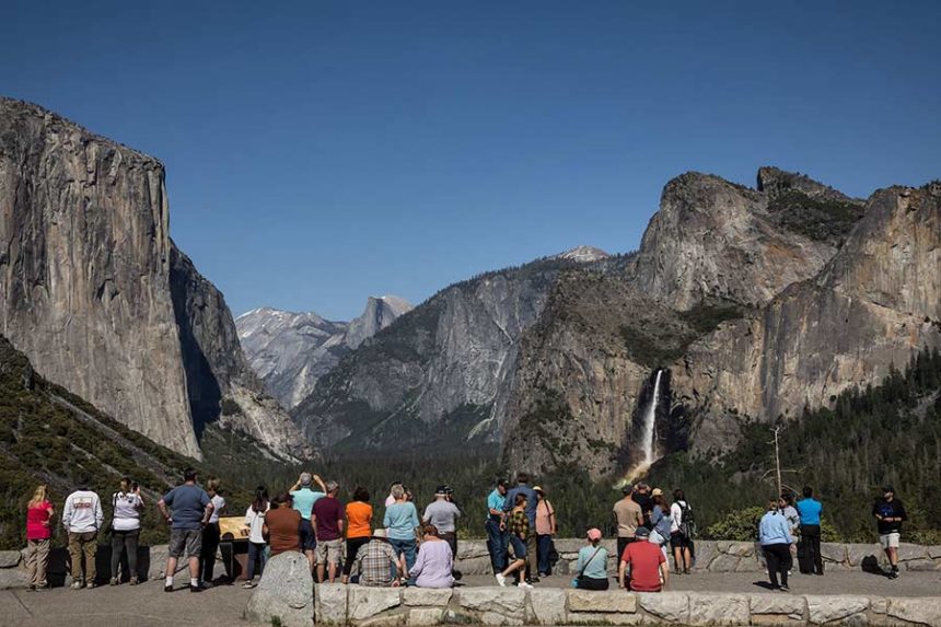 Visitors take in the scenery at Yosemite National Park on May 20. Mandatory Credit: Carlos Avila Gonzalez/San Francisco Chronicle/Getty Images via CNN Newsource