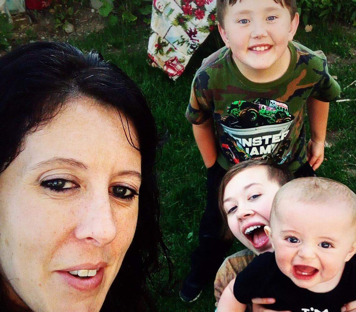 Onyx Cornish, right middle, with her mother, Crystal Thompson, and two younger brothers. Onyx, 18, was killed on Monday, and her father is the suspect. Crystal Thompson Provided