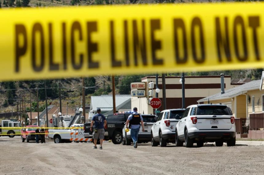 Police and other emergency personnel are seen after a reported shooting in Anaconda, Montana on Friday, Aug. 1, 2025. | Joseph Scheller, The Montana Standard via Associated Press