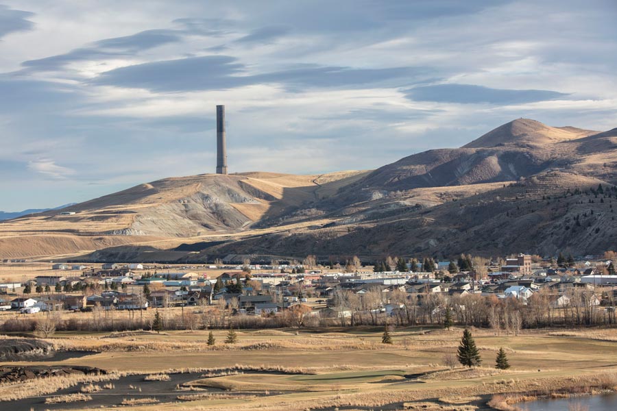The Anaconda Smelter, which was in operation for 97 years before closing in 1980, looms in the background of this view of the town in 2019. | Louise Johns for The Washington Post, Getty Images via CNN Newsource
