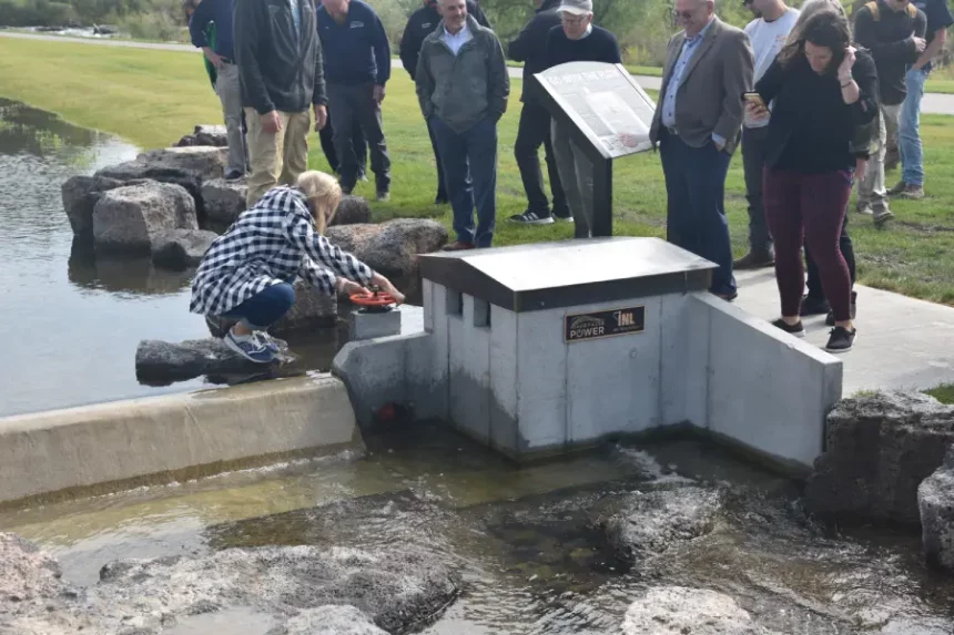 City Council President Lisa Burtenshaw tests the new Hydropower exhibit | Treydon Baylor, EastIdahoNews.com