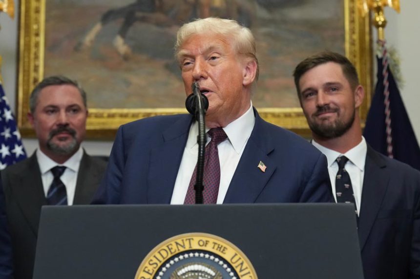 President Donald Trump speaks as Cody Campbell, left, and professional golfer Bryson DeChambeau listen during an event for the signing of an executive order restarting the Presidential Fitness Test in public schools, Thursday, July 31, 2025, in the Roosevelt Room of the White House in Washington. | Jacquelyn Martin, Associated Press