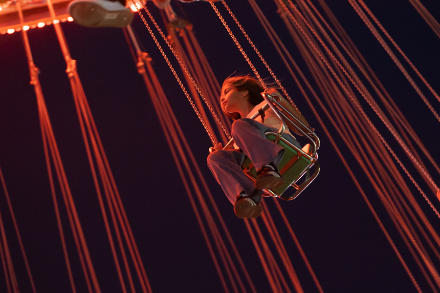 A girl swings past on a ride. | Daniel V. Ramirez, EastIdahoNews.com