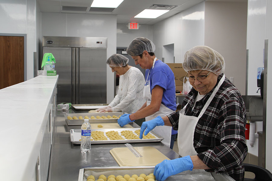Philoptochos Society members preparing Koulourakia.
