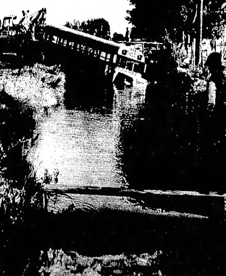 School bus takes dive into canal.