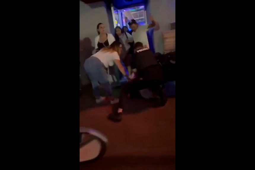 A screenshot from a TikTok video showing the moment Benjamin Avecedo Jr. kicked an officer and Briana Christine Diaz in the head Sunday morning. | Courtesy
