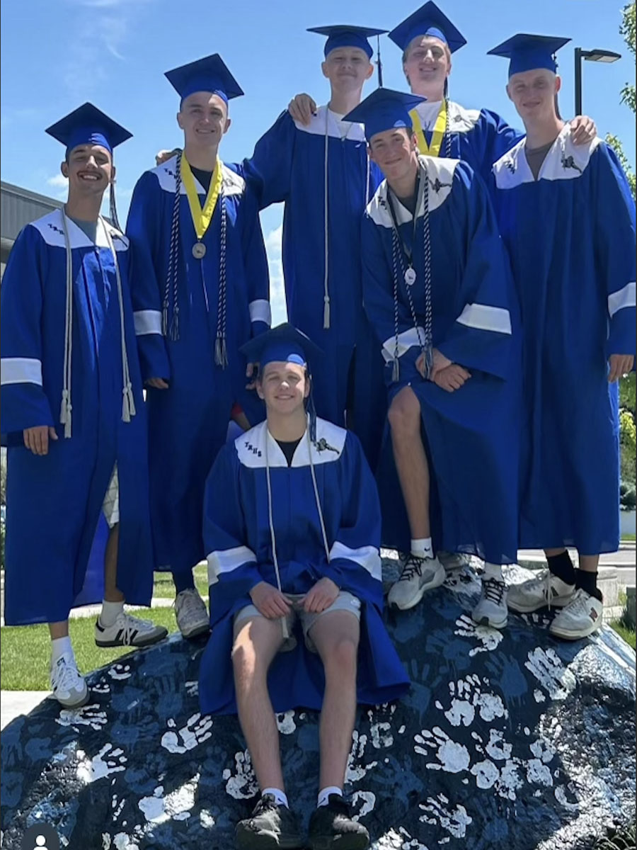 Tanner Scoresby with his friends the day he graduated from high school.