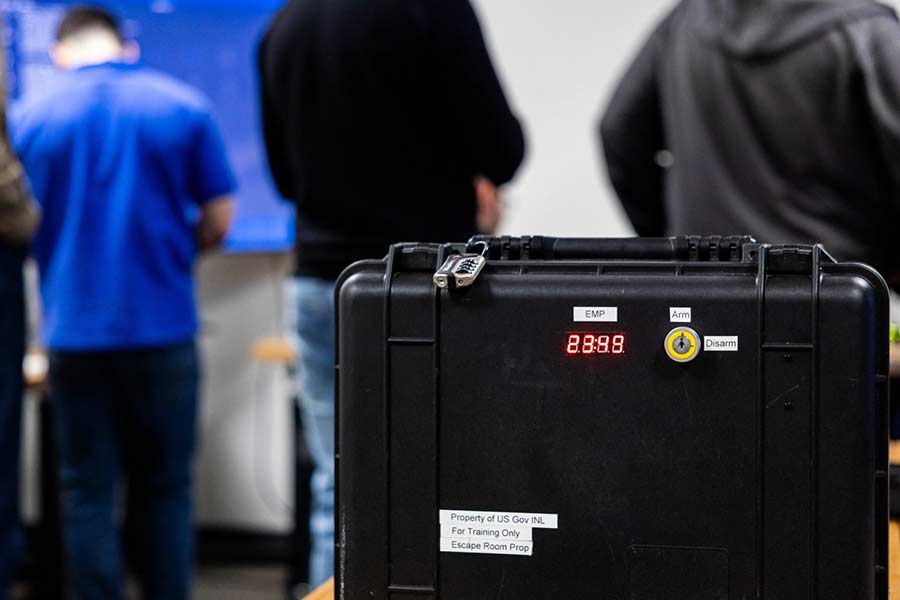 The briefcase with a timer is the central prop in “Insider Threat,” an escape room designed to help security specialists decipher clues and solve problems. | Courtesy INL