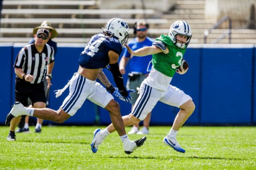 BYU quarterback McCae Hillstread evades a tackle during Saturday’s scrimmage. | Abby Shelton, BYU photo.