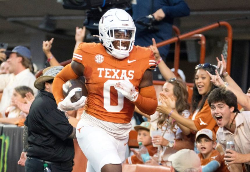 FILE - Texas linebacker Anthony Hill, Jr. runs through the back of the end zone after making an interception for a touchdown during the first half of an NCAA football game against Louisiana-Monroe, Saturday, Sept. 21, 2024, in Austin, Texas. (AP Photo/Michael Thomas, File)