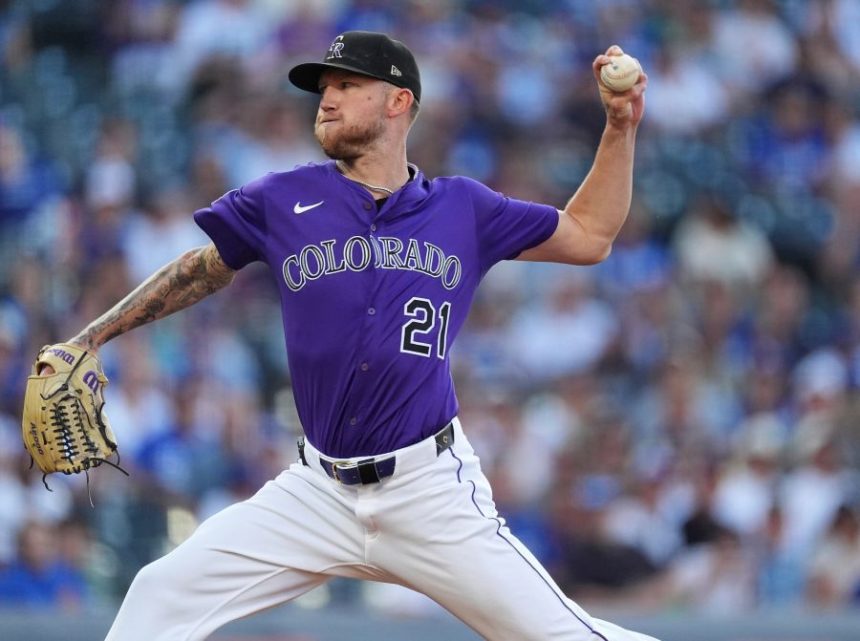 Colorado Rockies starting pitcher Kyle Freeland works against the Los Angeles Dodgers in the first inning of a baseball game, Monday, Aug. 18, 2025, in Denver. (AP Photo/David Zalubowski)