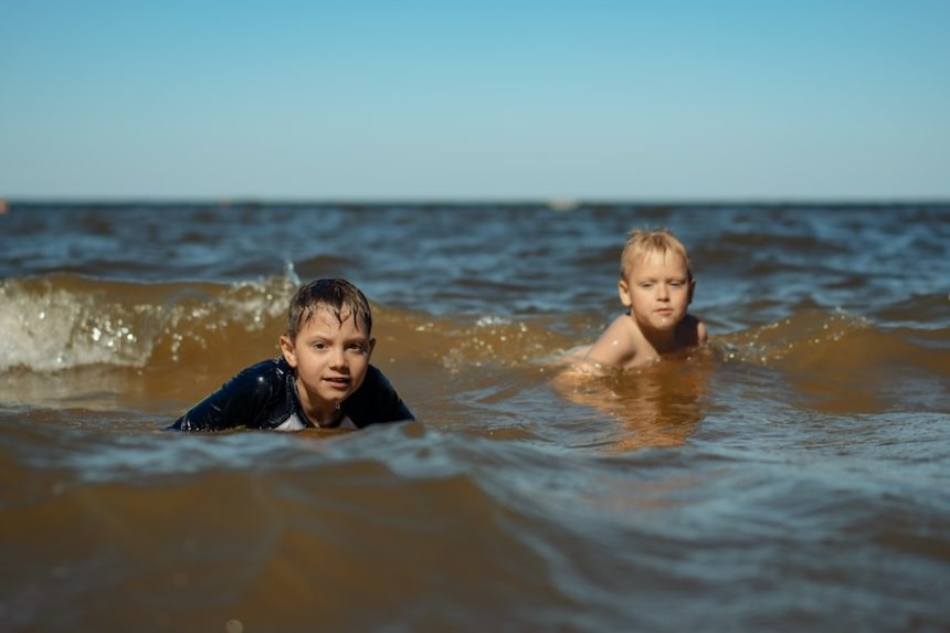 having fun in sea children on vacation 2025 03 09 00 56 36 utc