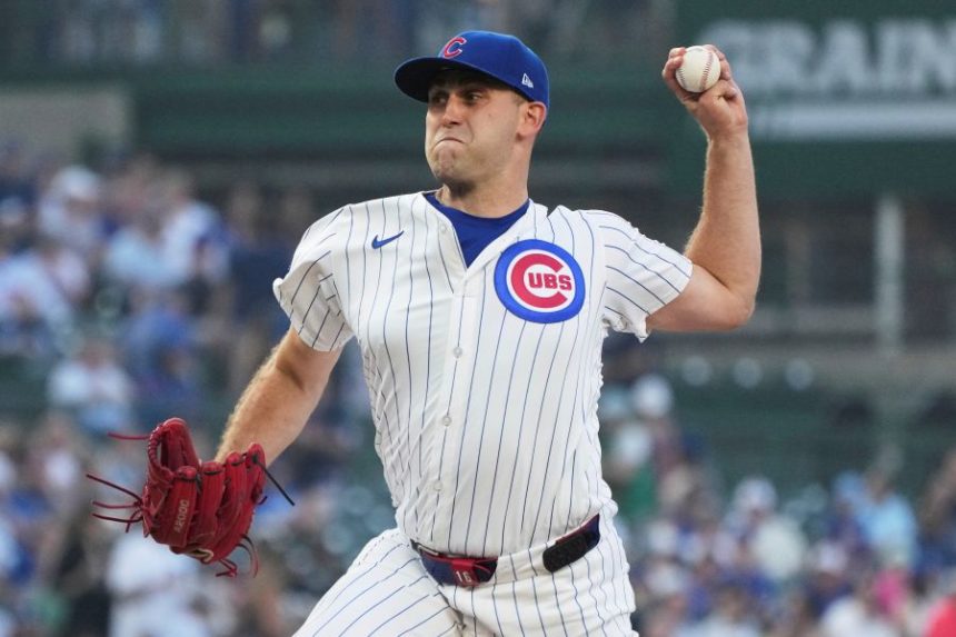 Chicago Cubs starting pitcher Matthew Boyd throws against the Kansas City Royals during the first inning of a baseball game in Chicago, Tuesday, July 22, 2025. (AP Photo/Nam Y. Huh)