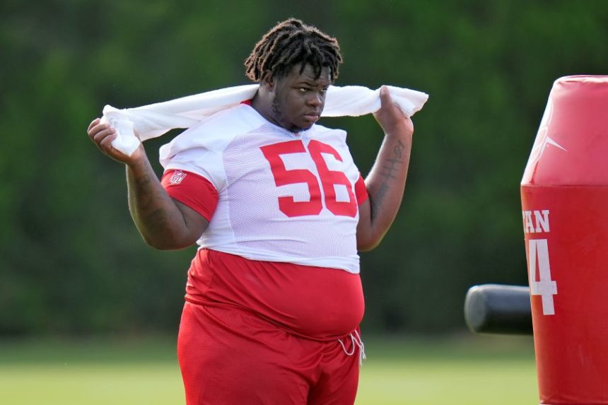 FILE - Tampa Bay Buccaneers defensive tackle Desmond Watson watches from the sideline during practice at NFL football training camp, Wednesday, July 23, 2025, in Tampa, Fla. (AP Photo/Chris O'Meara, File)