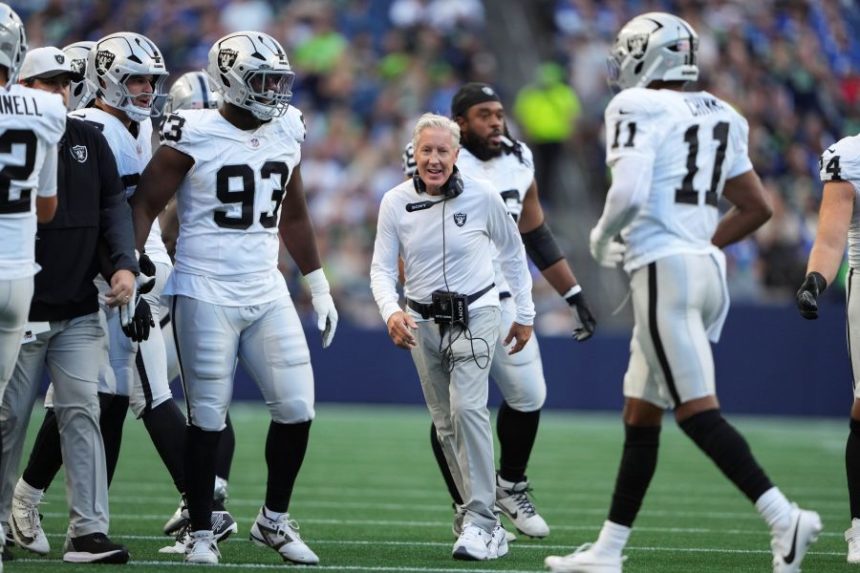 Las Vegas Raiders head coach Pete Carroll reacts after an interception by the Raiders during the first half of an NFL preseason football game against the Seattle Seahawks, Thursday, Aug. 7, 2025, in Seattle. (AP Photo/Lindsey Wasson)