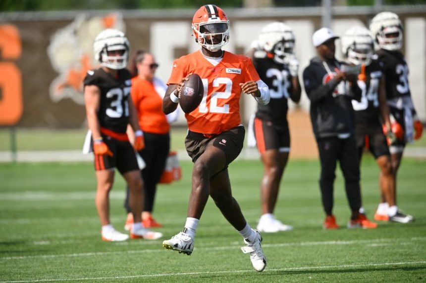 FILE - Cleveland Browns quarterback Shedeur Sanders (12) scrambles during practice at the team's NFL football training camp, Saturday, July 26, 2025, in Berea, Ohio. (AP Photo/David Richard, File)