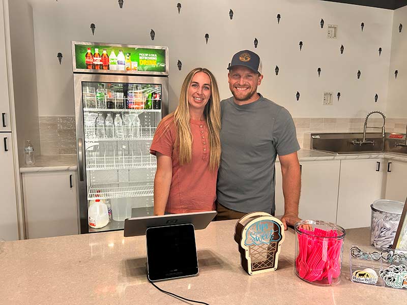Taylee Brinkerhoff, left, with her husband inside Creamy Daze in Rexburg. | Rett Nelson, EastIdahoNews.com