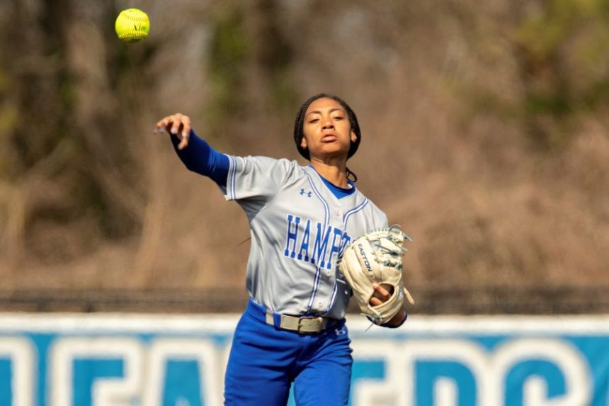 FILE - Hampton infielder Mo'ne Davis (3) fields a ground ball and throws to first base during an NCAA softball game on Sunday, March 6, 2022 in Hampton, Va. (AP Photo/Mike Caudill, File)