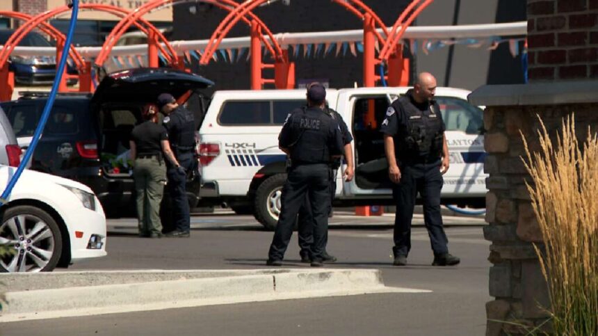 Scene at a Layton carwash where a 2-year-old girl was hit by a truck in the parking lot of a car wash on Friday. | Mike Anderson, KSL TV