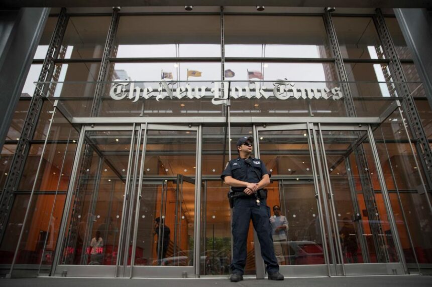 A police officer stands guard outside The New York Times building in New York, on June 28, 2018. | Mary Altaffer, Associated Press