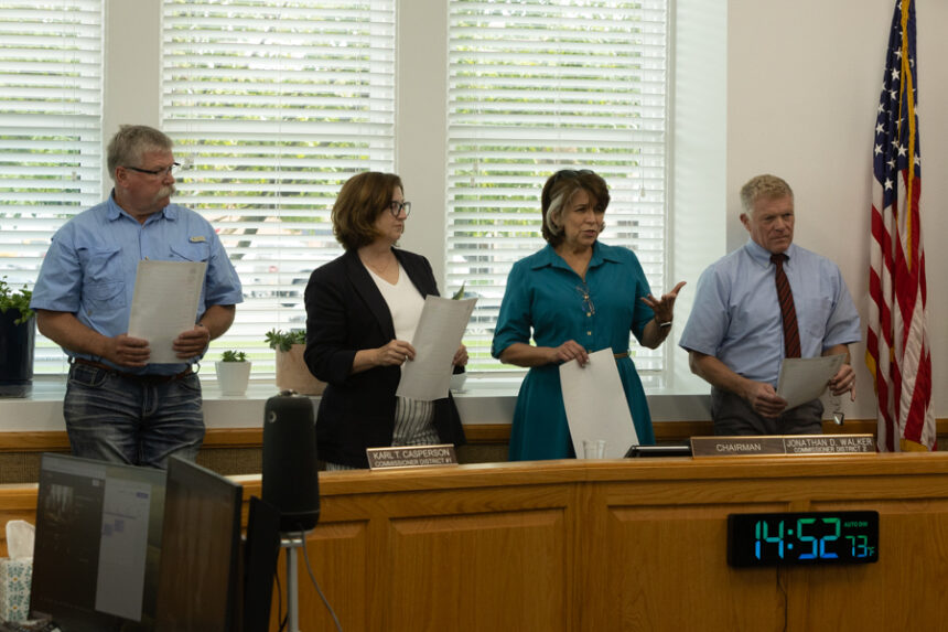 Commissioner Karl Casperson (far left), Commissioner Michelle Mallard (left), Idaho Falls Mayor Rebecca Casper (right), Commissioner Jon Walker (far right) during the signing of a proclomation to make Sept. 14, 2025 Missing Persons Day in rememberance of Amber Hoopes. | Daniel V. Ramirez, EastIdahoNews.com