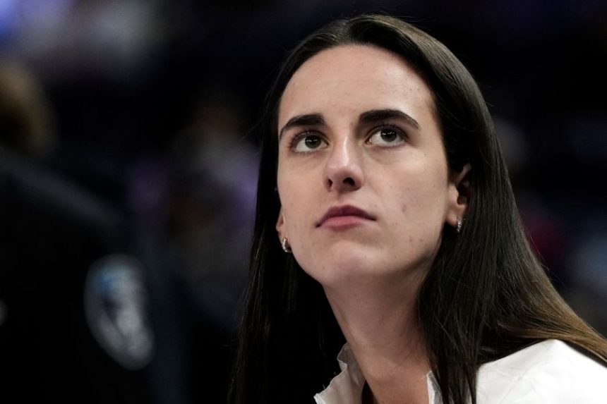 Indiana Fever's Caitlin Clark sits on the bench before a WNBA basketball game against the Golden State Valkyries, Sunday, Aug. 31, 2025, in San Francisco. (AP Photo/Godofredo A. Vásquez)