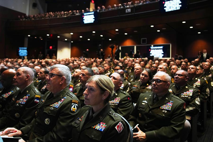 U.S. military senior leadership listen as President Donald Trump speaks at Marine Corps Base Quantico, Tuesday, Sept. 30, 2025 in Quantico, | Andrew Harnik, Associated Press