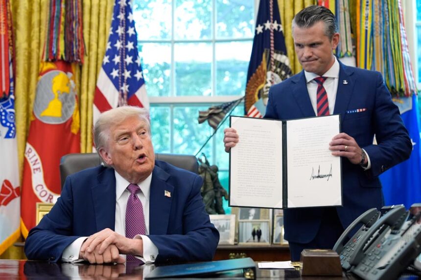 President Donald Trump speaks as Defense Secretary Pete Hegseth holds a signed executive order in the Oval Office of the White House, Friday, Sept. 5, 2025, in Washington. | Alex Brandon, Associated Press