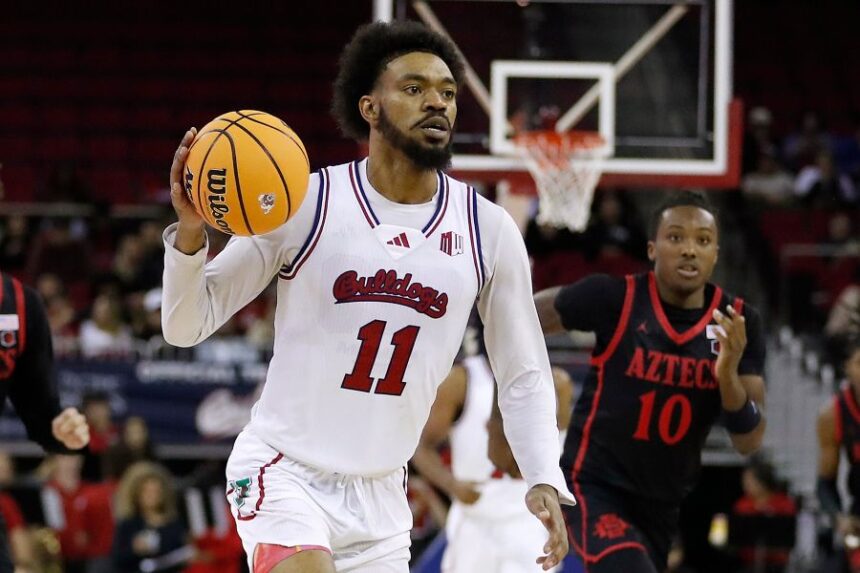 FILE - Fresno State's Mykell Robinson drives against San Diego State during the second half of an NCAA college basketball game in Fresno, Calif., Wednesday, Dec. 4, 2024. (AP Photo/Gary Kazanjian, File)