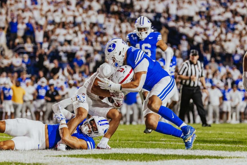 BYU safety Faletau Satuala and linebacker Jack Kelly combine for a sack and a safety during the first half of an NCAA football game, Saturday, Sept. 6, 2025 at LaVell Edwards Stadium in Provo, Utah. (Photo: Tyler Staten for KSL.com)
