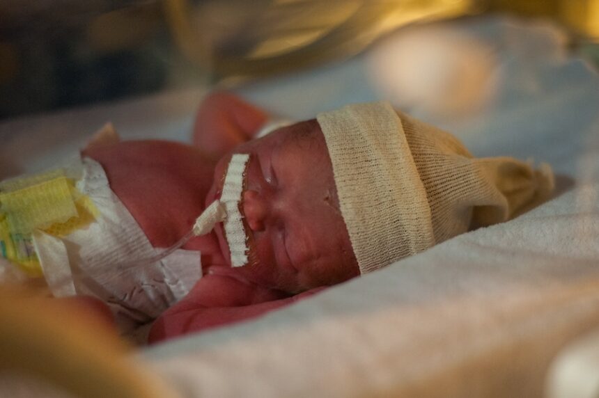 closeup shot of a newborn baby in a hospital bed 2025 02 09 20 08 23 utc