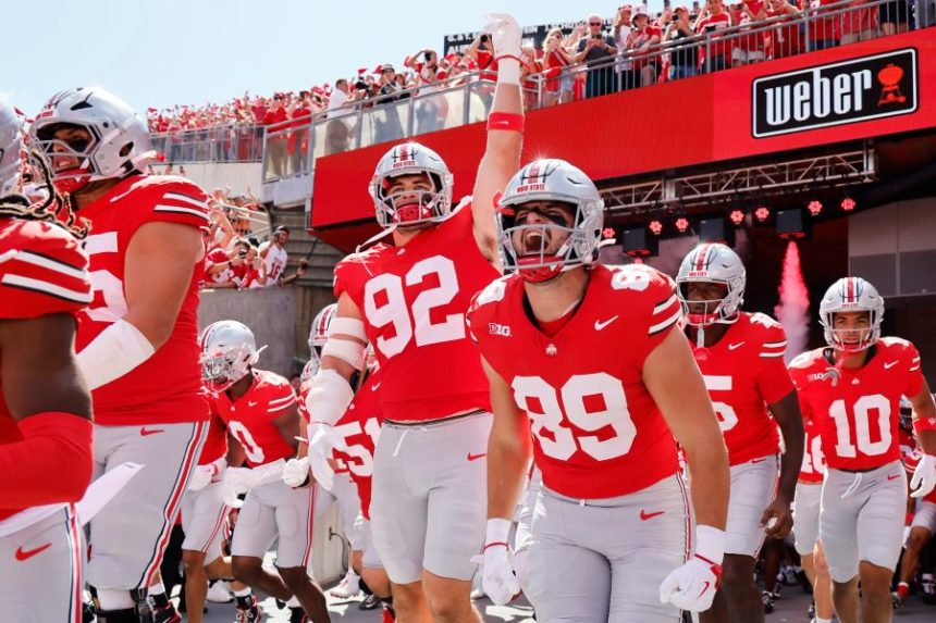 Ohio State players run on to the field for their NCAA college football game against Texas, Saturday, Aug. 30, 2025, in Columbus, Ohio. (AP Photo/Jay LaPrete)