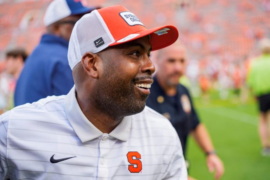 Syracuse head coach Fran Brown heads off the field after defeating Clemson in an NCAA college football game Saturday, Sept. 20, 2025, in Clemson, S.C. (AP Photo/Jacob Kupferman)