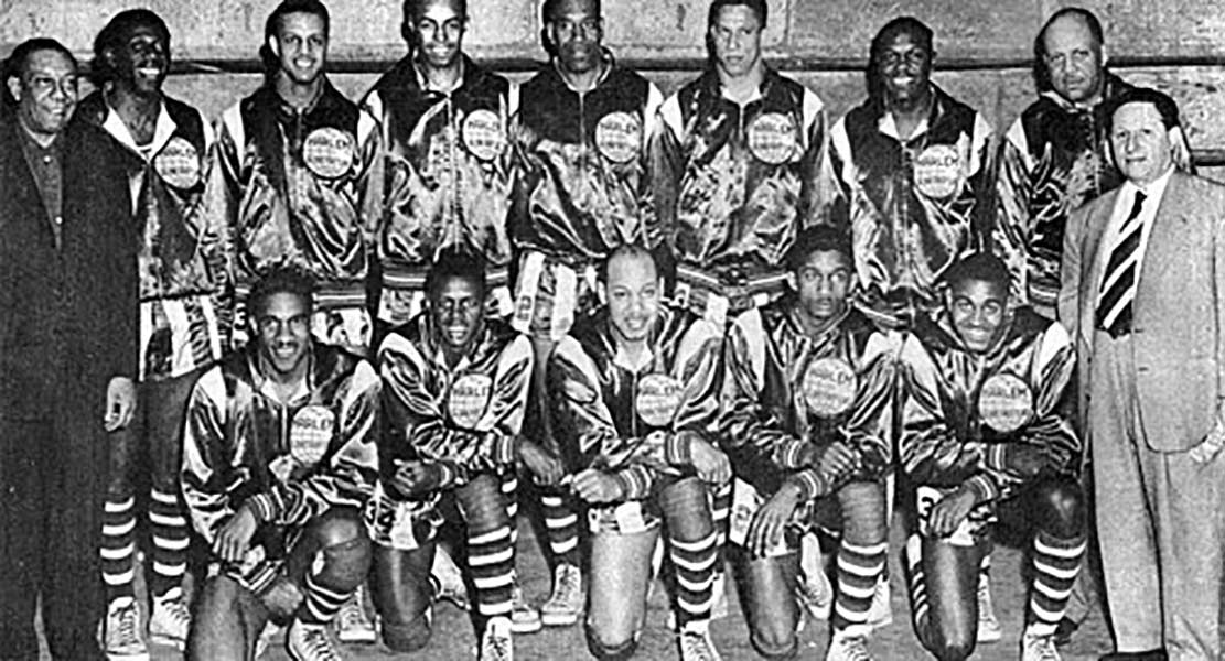 The 1950 World Series Harlem Globetrotters, with owner Abe Saperstein, right, and team secretary W. S. Welch, left | Wikipedia