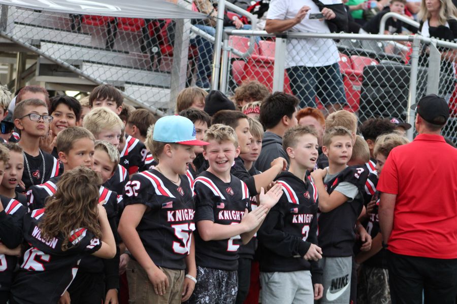 Hillcrest Grid Kid players get ready to lead the Knights onto the field. | Allan Steele, EastIdahoSports.com.