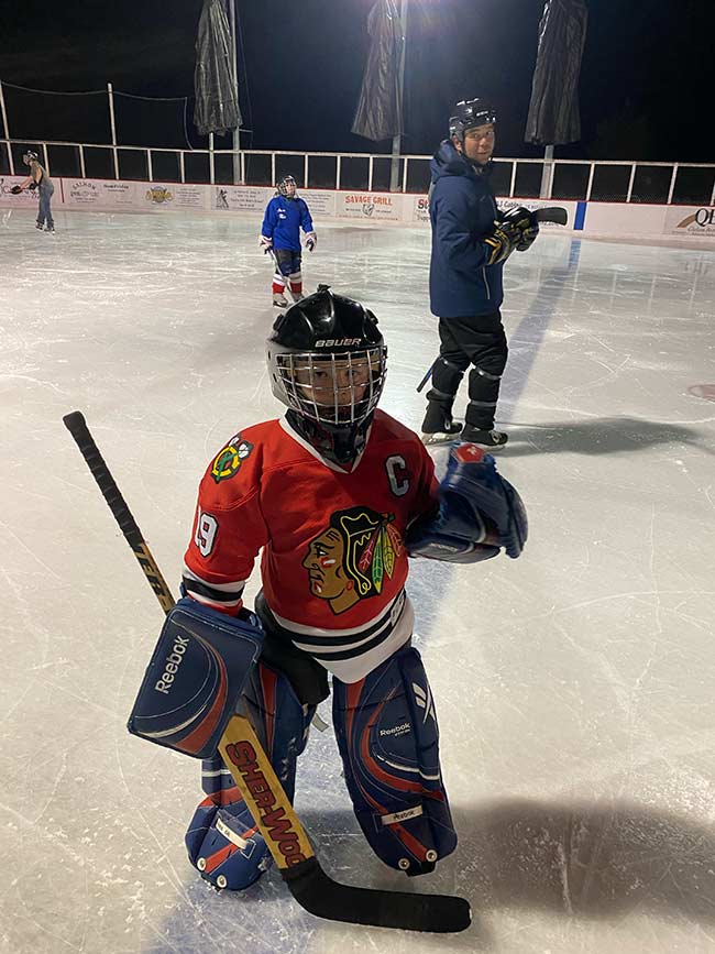 Kid playing hockey at the Salmon Hockey Rink | Courtesy Robert Crispin