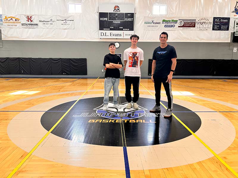 Kye Ellsworth, left, did the artwork on the half-pipe. Miles McDonald, center, is a coach at Jump Start and Sean, right, the owner's son. | Rett Nelson, EastIdahoNews.com