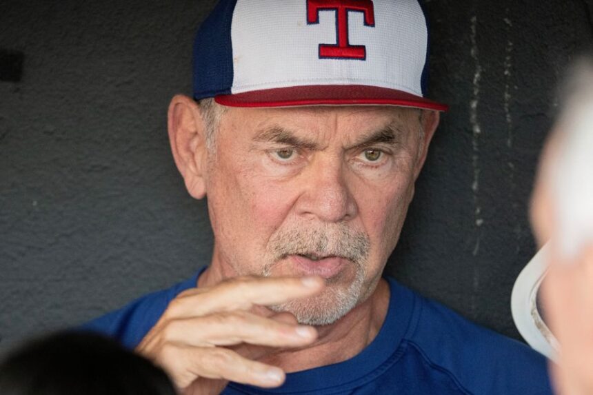 Texas Rangers manager Bruce Bochy speaks with reporters before the start of a baseball game against the Cleveland Guardians, Friday, Sept. 26, 2025, in Cleveland. (AP Photo/Phil Long)