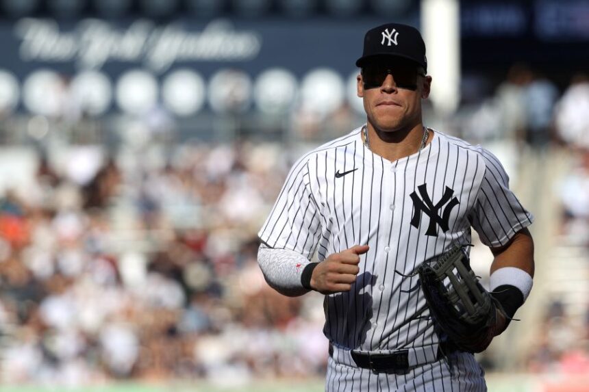 New York Yankees' Aaron Judge runs to the dugout during the third inning of a baseball game against the Baltimore Orioles, Sunday, Sept. 28, 2025, in New York. (AP Photo/Pamela Smith)