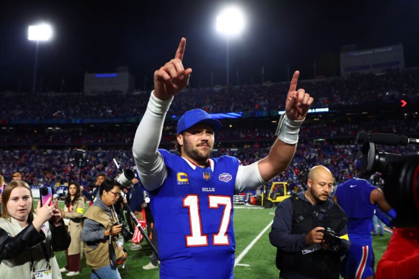 Buffalo Bills quarterback Josh Allen (17) celebrates the team's win over Baltimore Ravens in an NFL football game in Orchard Park, N.Y., Sunday, Sept. 7, 2025. (AP Photo/Jeffrey T. Barnes)