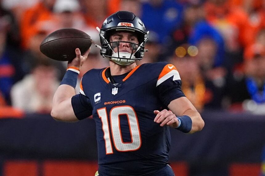 Denver Broncos quarterback Bo Nix (10) throws against the Cincinnati Bengals during the first half of an NFL football game Monday, Sept. 29, 2025, in Denver. (AP Photo/David Zalubowski)