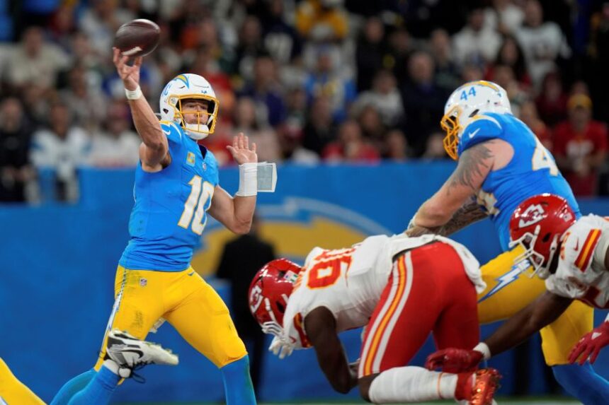 Los Angeles Chargers quarterback Justin Herbert passes against the Kansas City Chiefs during the second half of an NFL football game, Friday, Sept. 5, 2025, in Sao Paulo. (AP Photo/Fernando Llano)
