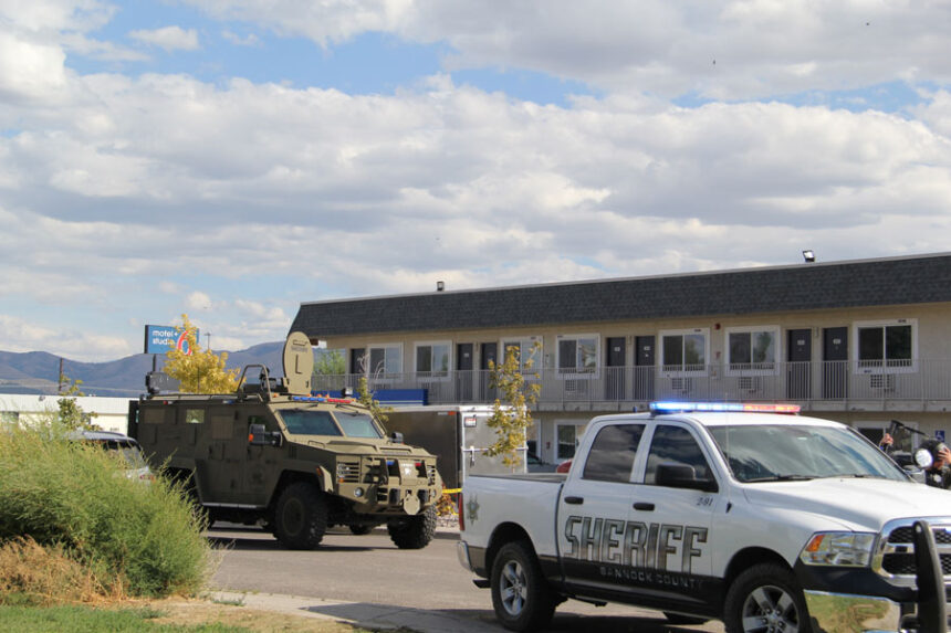 Armored vehicle leaving standoff