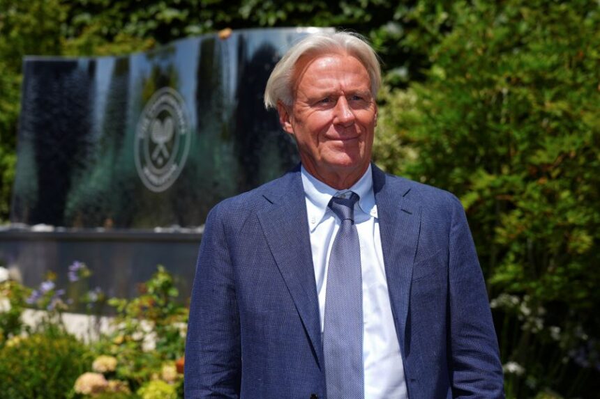 FILE - Tennis great Bjorn Borg poses for a photo as he arrives for Day 11 at the Wimbledon Tennis Championships in London, July 10, 2025. (AP Photo/Joanna Chan, File)