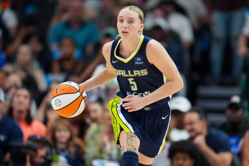 FILE - Dallas Wings guard Paige Bueckers dribbles up court against the Indiana Fever during the second half of a WNBA basketball game Friday, Aug. 1, 2025, in Dallas. (AP Photo/Julio Cortez, File)