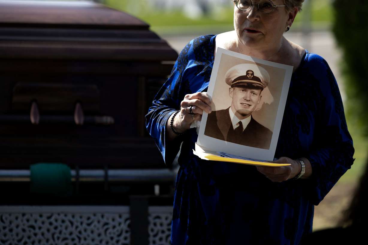 Terri Trick memorializes her uncle, Utah native Ensign Howard Holding, during his graveside ceremony in the Salt Lake City Cemetery on Friday. | Laura Seitz, Deseret News